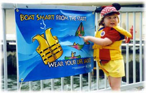Young Girl Waring a Life Jacket Image